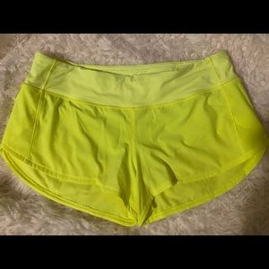 Lululemon highlighter yellow speed up shorts 2.5 size 8